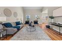 Inviting living room with hardwood floors, stylish decor, and neutral color palette at 939 Whistler Ln, Canton, GA 30114