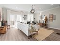 Spacious living room with neutral tones, stylish decor, and plenty of seating for entertaining guests at 1991 Hollywood Nw Rd # 14, Atlanta, GA 30318