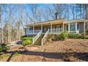 Lovely single-story home featuring a covered front porch at 2704 Loring Nw Rd, Kennesaw, GA 30152