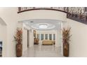 Bright foyer with high ceilings, decorative chandelier, and an open view of the adjacent living spaces at 2146 Greensward Ne Dr, Atlanta, GA 30345