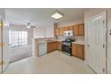 Well-equipped kitchen with modern appliances, ample cabinet space, and an open layout, with easy access to the living area at 907 Redwood Dr, Norcross, GA 30093