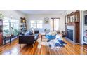 Bright living room featuring hardwood floors, fireplace, and modern furniture at 1101 United Se Ave, Atlanta, GA 30316