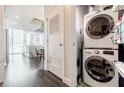 Convenient laundry area with stacked washer and dryer units at 44 Peachtree Nw Pl # 829, Atlanta, GA 30309