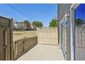 Private back deck with wooden railing, perfect for outdoor relaxation and entertaining at 543 Harbor Lake Ct, Marietta, GA 30066