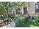 Brick townhome with well-maintained front yard and wrought iron railings at 8 Honour Nw Ave # 6, Atlanta, GA 30305