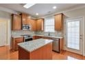 Well-equipped kitchen featuring granite countertops, stainless steel appliances, and central island at 251 Vinings Retreat Sw Vw, Mableton, GA 30126