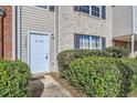 Inviting front entrance with well-kept bushes and a clear view of the house number at 2720 Marlin Dr, Mcdonough, GA 30253
