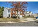 Well-maintained townhomes with neat lawns and mature trees, providing a comfortable neighborhood feel at 2720 Marlin Dr, Mcdonough, GA 30253