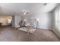 Inviting living room with plush carpeting and neutral tones, perfect for relaxing at 2720 Marlin Dr, Mcdonough, GA 30253