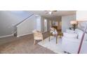 Comfortable living room with a ceiling fan, neutral walls, and cozy furniture at 2720 Marlin Dr, Mcdonough, GA 30253