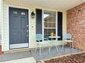 Inviting front porch featuring outdoor seating, creating a cozy and welcoming entrance at 3465 Jones Ferry Ln, Alpharetta, GA 30022