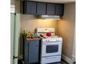 Kitchen featuring an electric stove and some storage space at 571 Grant Sw St, Atlanta, GA 30315