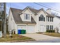 Charming two-story home with attached garage, offering a blend of comfort and style at 3958 Waldrop Hills Dr, Decatur, GA 30034