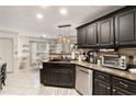 Modern kitchen with stainless steel appliances and granite countertops at 1252 Highfield Dr, Lawrenceville, GA 30043