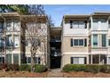 Beautiful condo with a traditional exterior, well-maintained landscaping, and multiple stories at 3001 Wingate Way, Atlanta, GA 30350