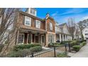 Street view showcasing craftsman-style home with inviting porch, landscaping, and neighborhood charm at 1918 Coal Pl, Atlanta, GA 30318