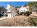 Inviting two-story home on a landscaped lot with a two-car garage at 2860 River Close Dr, Decatur, GA 30034