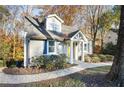 Beautiful home exterior with a walkway, lovely landscaping, and a classic design at 3451 Keswick Ct, Atlanta, GA 30341