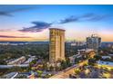 Exterior view of the building complex showcasing its design and surrounding urban landscape at 2881 Peachtree Ne Rd # 1001, Atlanta, GA 30305