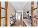 Elegant foyer featuring hardwood floors and a view of the living spaces at 4087 Glenn Rd, Powder Springs, GA 30127