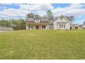 Charming two-story house with a spacious lawn and a blend of traditional and modern design elements at 46 Lexie Ct, Rockmart, GA 30153