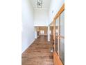 Bright entryway with high ceilings, wood floors, and open view to living areas at 46 Lexie Ct, Rockmart, GA 30153