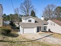 Charming renovated home with a new roof, attached garage, and freshly painted exterior at 190 Clydesdale Se Ln, Mableton, GA 30126