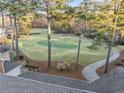 An aerial view of the home's golf course that shows the beautiful landscaping at 9795 Terrace Lake Pointe, Roswell, GA 30076