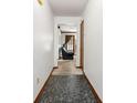 Entryway with tile flooring leading to the living area at 7281 Fernwood Dr, Riverdale, GA 30296