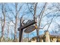 Lismore community sign provides directions and highlights the neighborhood's charming architectural details at 806 Lismore Se, Smyrna, GA 30080