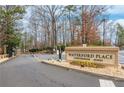 Waterford Place condominium homes entrance sign with well-maintained landscaping and welcoming atmosphere at 806 Lismore Se, Smyrna, GA 30080