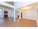 Bright and airy living room featuring hardwood floors and a fireplace at 2474 Starfire Ln, Loganville, GA 30052