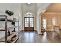 Elegant foyer featuring hardwood floors, a grand arched entrance, and abundant natural light at 2892 Darlington Run, Duluth, GA 30097