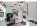 An additional mud room with a window and door provides versatile space for storage or entry at 511 Monroe Cole Rd, Dallas, GA 30157