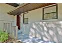 Inviting front entrance with a wood door, white brick, and well-maintained landscaping at 1453 Midview Dr, Decatur, GA 30032