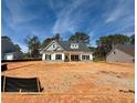 New construction home with unfinished yard set in a new neighborhood at 1471 Stephens View Dr, Loganville, GA 30052