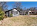 Bungalow with painted brick and a screened porch in a well-established neighborhood at 2147 Cascade Sw Rd, Atlanta, GA 30311