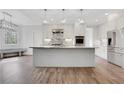 Bright, modern kitchen with stainless steel appliances and large center island at 325 William Falls Dr, Canton, GA 30114