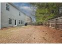 Spacious, private backyard with a wood fence and plenty of room for recreation at 981 Sonoma Dr, Lawrenceville, GA 30045