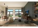 Bright living room showcases a modern sofa, stylish decor, and large windows offering a city view at 567 Ponce De Leon Ne Ave # 312, Atlanta, GA 30308