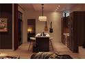 Modern kitchen with a center island, guitars hanging on the wall, and sleek cabinetry at 567 Ponce De Leon Ne Ave # 502, Atlanta, GA 30308