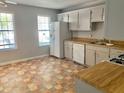 Bright kitchen area with natural light, complete with essential appliances and plenty of counter space at 3980 Bayside Cir, Atlanta, GA 30340