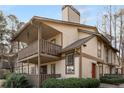 Stylish condo building with private balconies, a well-maintained facade, and appealing architectural details at 707 Woodcliff Dr, Atlanta, GA 30350