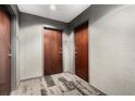 Hallway on residential floor with unit door at 400 W Peachtree Nw St # 3204, Atlanta, GA 30308