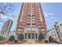 Striking exterior showcasing an upscale high-rise building with elegant architecture, manicured landscaping, and inviting entrance at 3435 Kingsboro Ne Rd # 1701, Atlanta, GA 30326