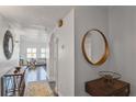 Inviting hallway featuring clean lines, modern decor, and a glimpse into the spacious living area ahead at 3435 Kingsboro Ne Rd # 1701, Atlanta, GA 30326