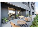 Spacious outdoor balcony with contemporary seating and a view of the surrounding area at 567 Ponce De Leon Ne Ave # 317, Atlanta, GA 30308