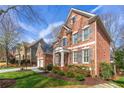 Elegant brick home with well-maintained landscaping and a welcoming entrance at 730 Glenferry Trl, Atlanta, GA 30328
