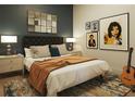 Cozy bedroom showcasing stylish decor, soft lighting, and a comfortable queen-sized bed at 567 Ponce De Leon Ne Ave # 415, Atlanta, GA 30308