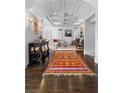 Bright foyer with high ceilings, a patterned rug, and hardwood floors at 1477 Village Park Ne Ct, Atlanta, GA 30319